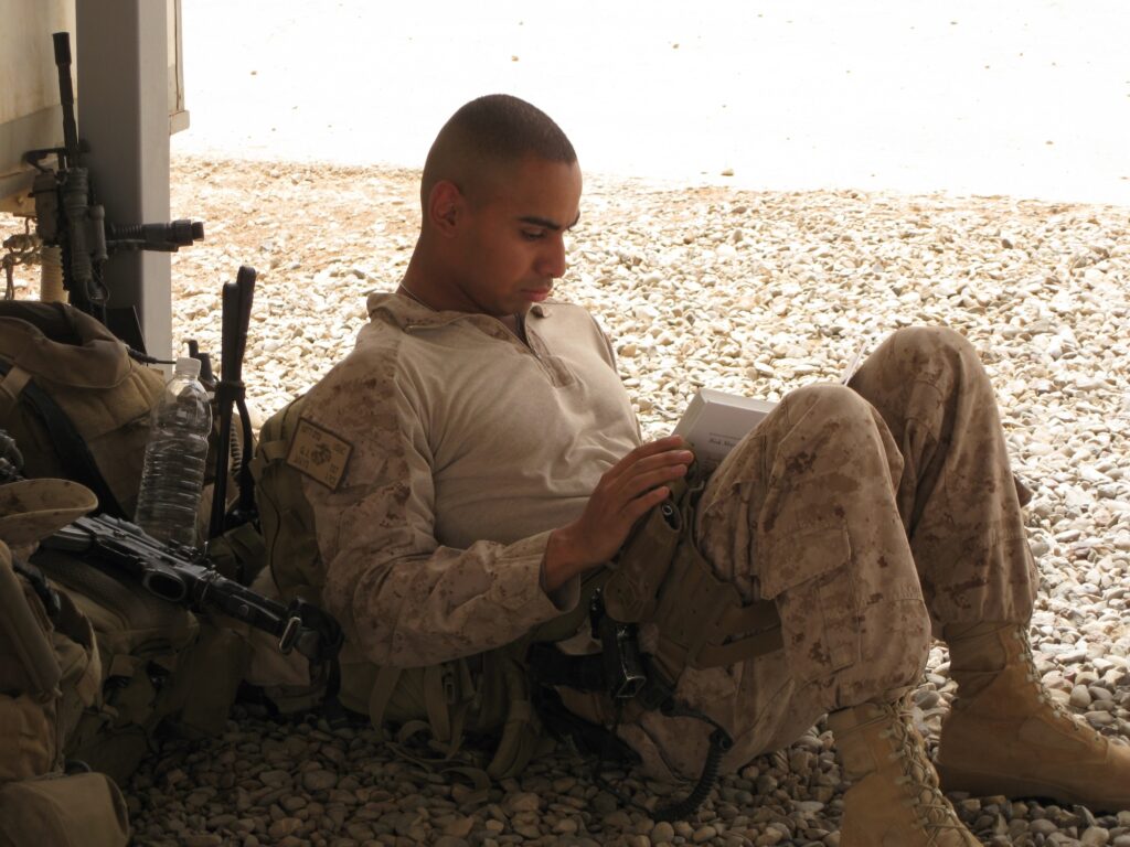 Studying at a LZ (landing zone) during Iraq deployment while waiting for a helo for wherever we were going next.